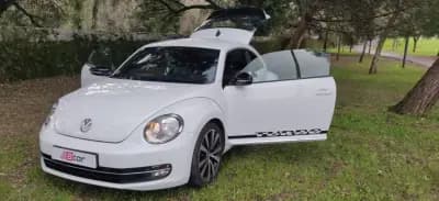 Vendo Volkswagen New Beetle 2011 - 18490 EUR, 163800 km - AUTO.MOTO.pt