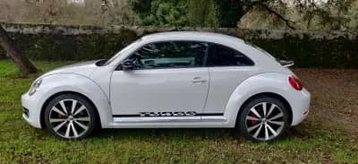 Vendo Volkswagen New Beetle 2011 - 18490 EUR, 163800 km - AUTO.MOTO.pt