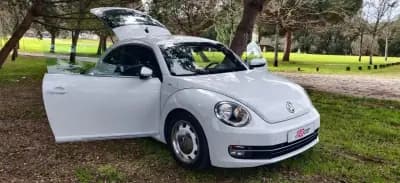 Vendo Volkswagen New Beetle 2015 - 14950 EUR, 156200 km - AUTO.MOTO.pt