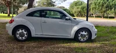 Vendo Volkswagen New Beetle 2015 - 14950 EUR, 156200 km - AUTO.MOTO.pt